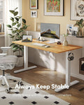 Modern home office with a wooden desk, computer setup, and decorative elements.